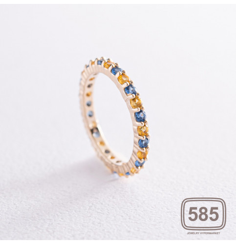 Кольцо с дорожкой голубых и желтых камней 
(желтое золото)