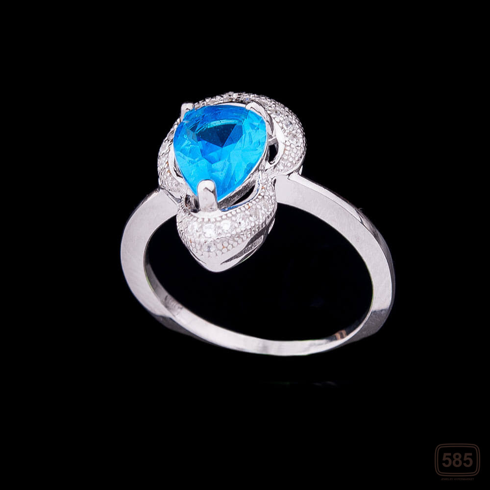 Кольцо с синтетической шпинелью синего 
цвета