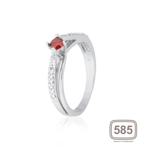 Серебряное кольцо с красными фианитами